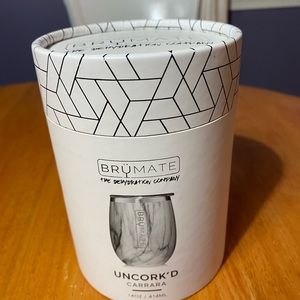 Brumate Uncork’d 14 ounce wine triple insulated cup holds 1/2 bottle of wine.